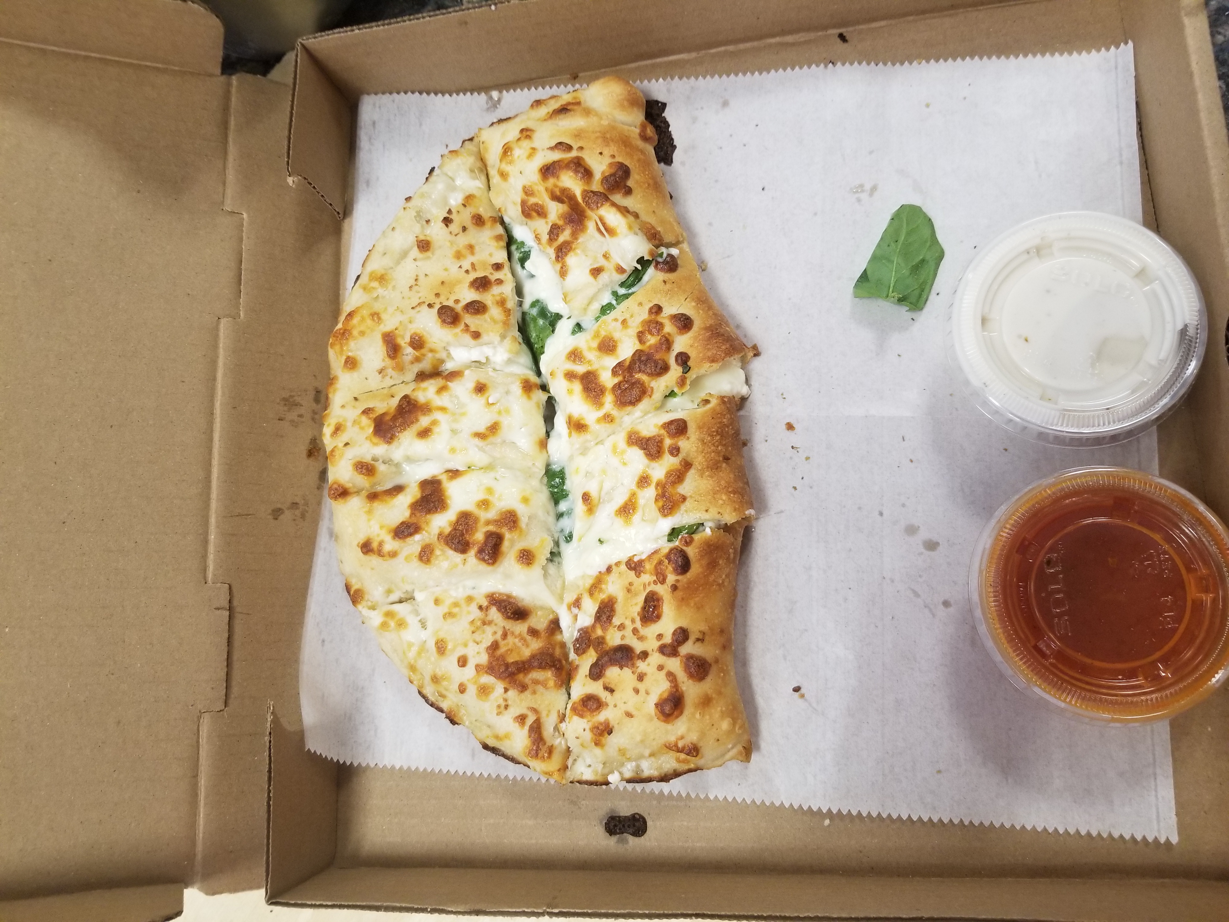 Order Spinach and Feta Calzone food online from Mona Lisa Pizza & Grill store, Cambridge on bringmethat.com