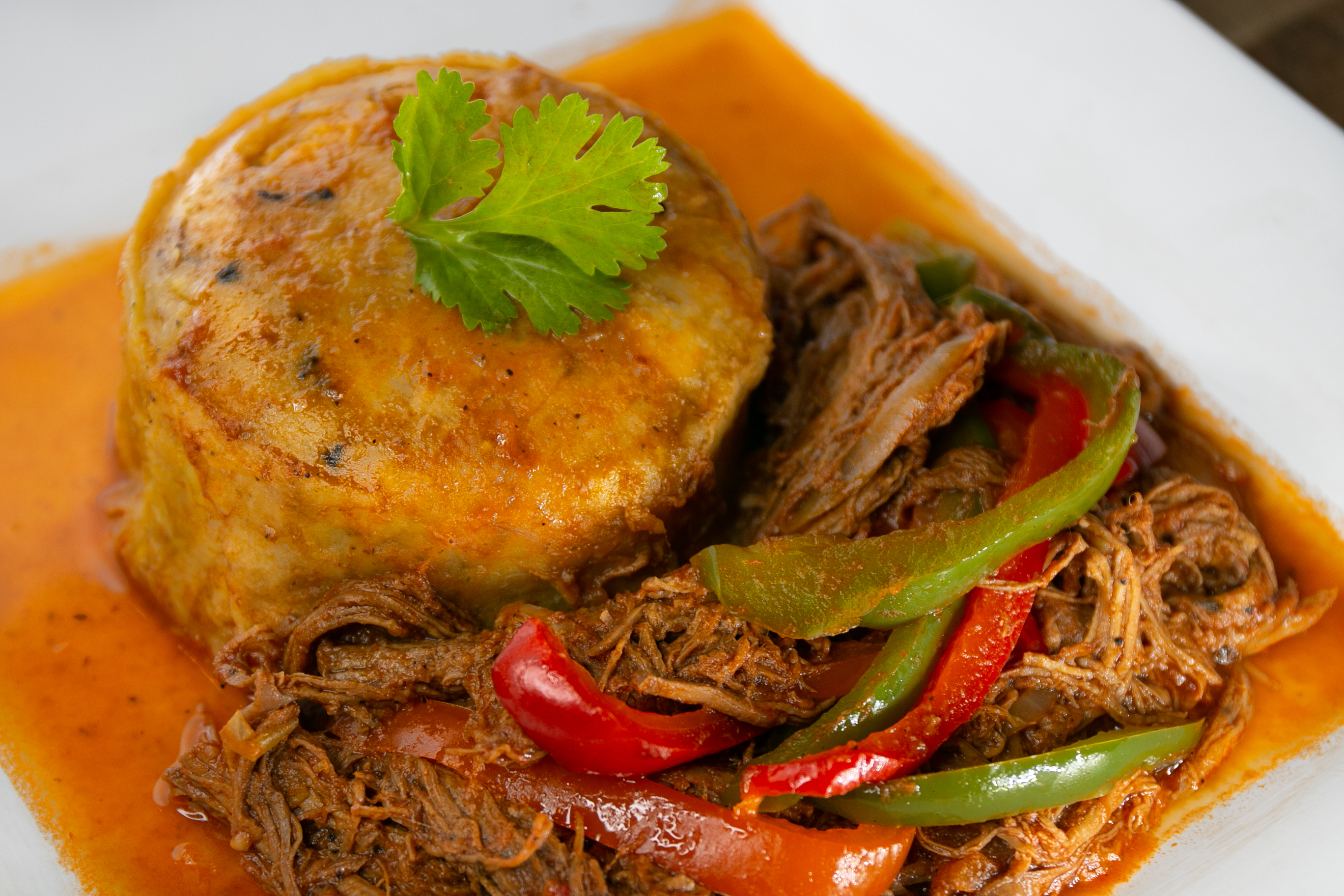 Order Mofongo con Ropa Vieja food online from Versace Dominican Restaurant store, Lilburn on bringmethat.com