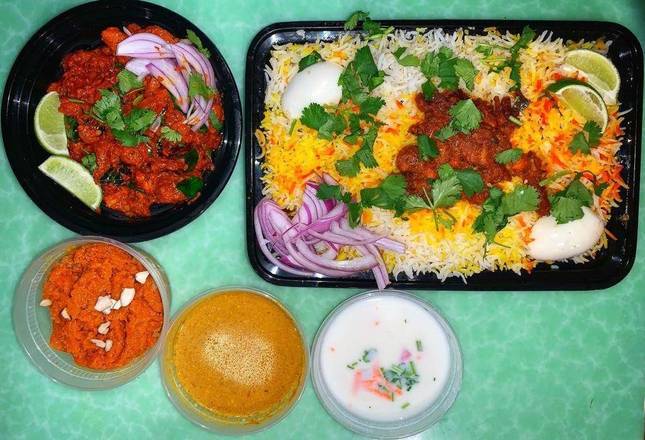 Order FAM-PAK | Special Chicken Biryani food online from Indian Delights store, Cedar Park on bringmethat.com