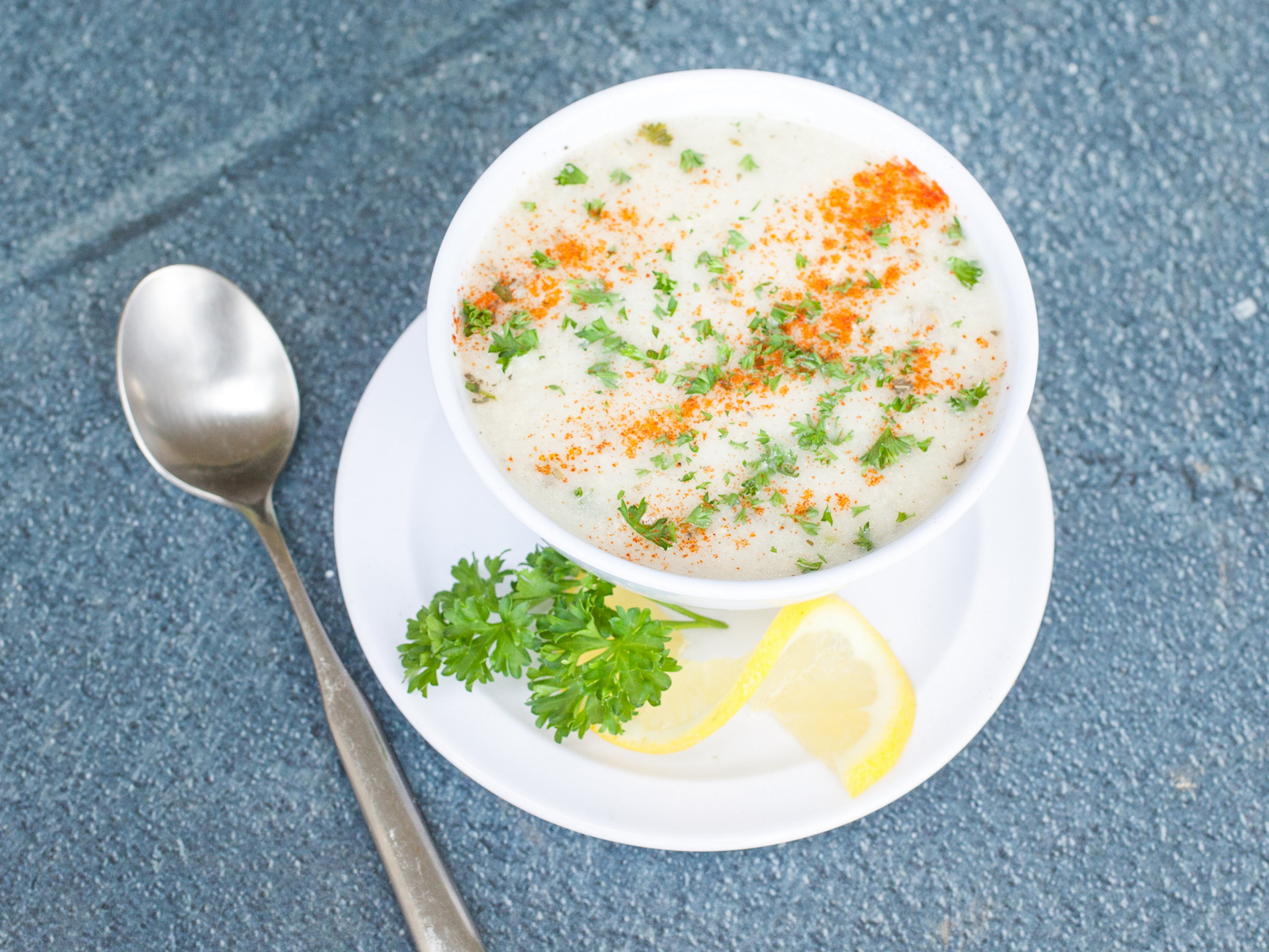 Order Avgolemono Soup food online from Santorini Gyro Greek Food store, Cathedral City on bringmethat.com