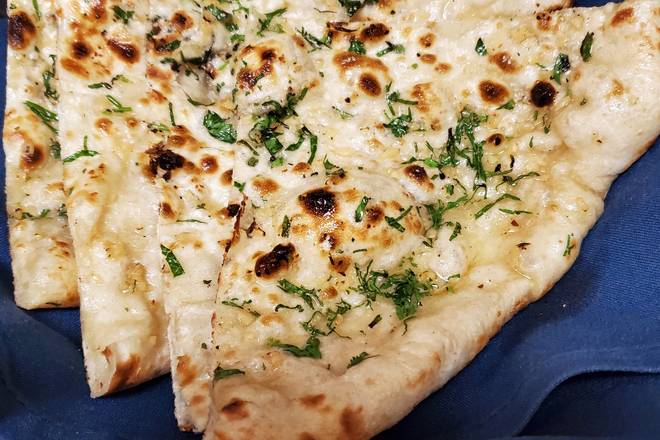 Order Garlic Chive Naan food online from Melange store, Parsippany-Troy Hills on bringmethat.com