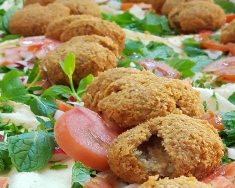 Order **Falafel Salad food online from Pizza Queen store, Providence on bringmethat.com