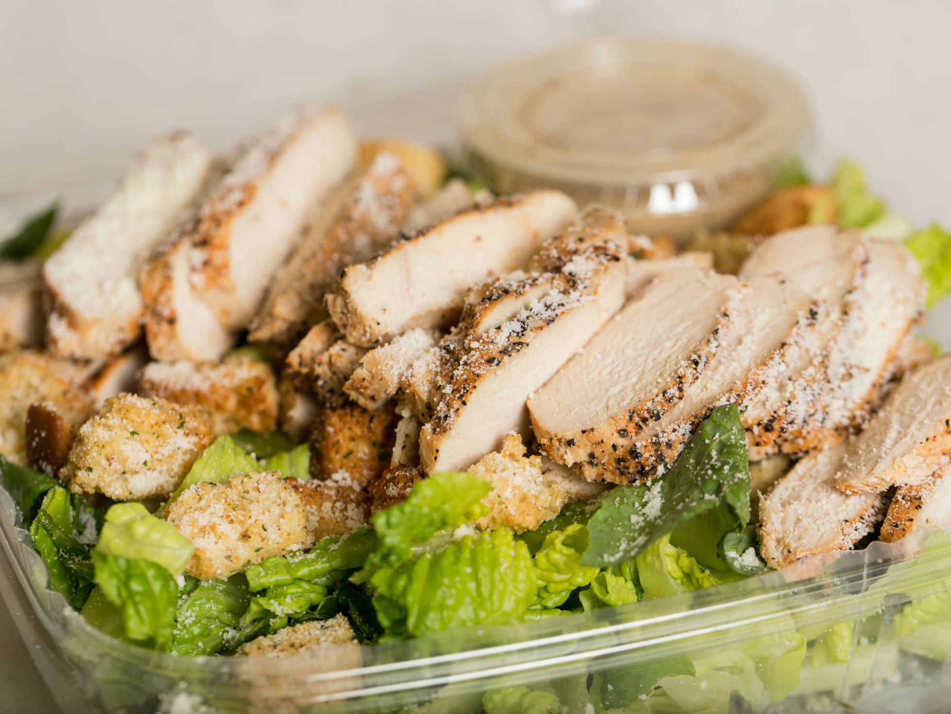 Order Chicken Caesar Salad food online from Reen Deli store, Philadelphia on bringmethat.com