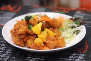 Order 35. Orange Chicken food online from Miko Thai Kitchen store, Hudson on bringmethat.com