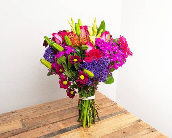 Order Vibrant Primary Colors Wrapped Bouquet food online from @Flowers Northeast El Paso store, El Paso on bringmethat.com