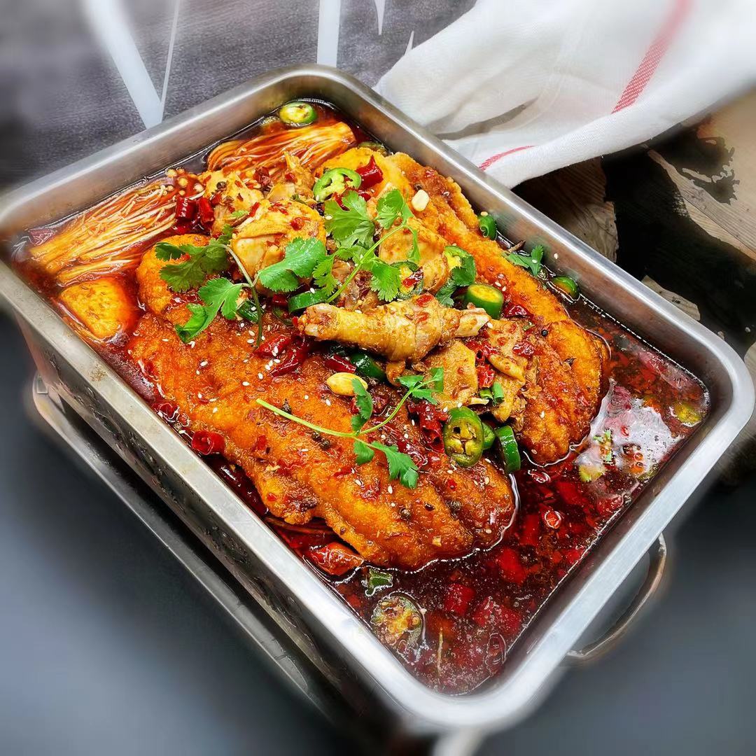 Order 农家麻辣鸡公烤鱼 ️️️ Numbing & spicy BBQ chicken & fish fillet  food online from Fashion Wok store, Foster City on bringmethat.com