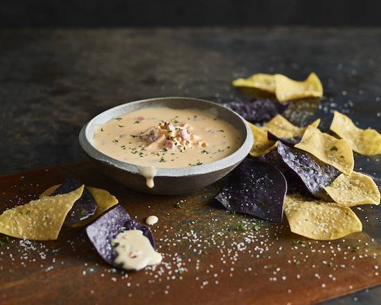Order Cheddar Cheese Queso & Chips food online from Ruby Tuesday store, Lithia Springs on bringmethat.com