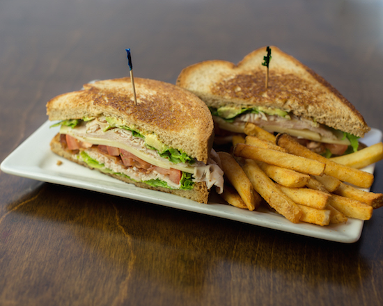 Order Turkey Avocado Bacon Club food online from Baker St. Pub & Grill store, The Woodlands on bringmethat.com