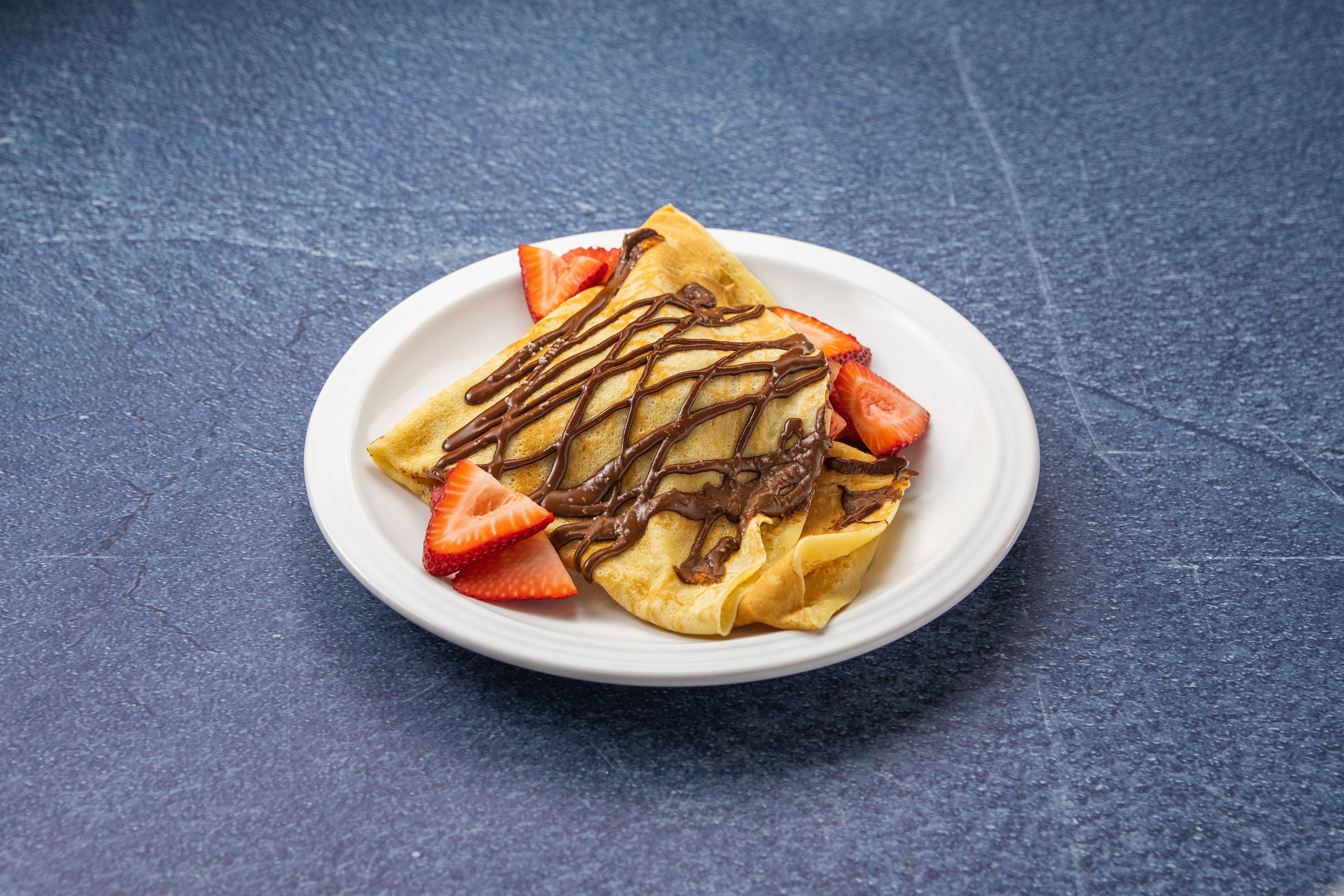 Order Strawberry Nutella Crepe food online from Crave Cafe store, West Hills on bringmethat.com