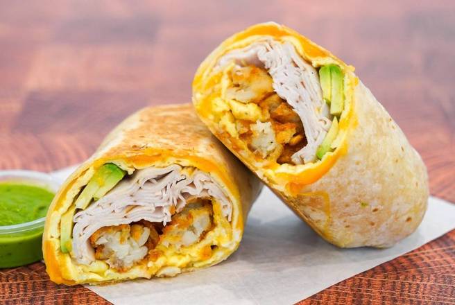 Order Smoked Turkey, Avocado, Egg, and Cheddar Breakfast Burrito food online from All About Breakfast store, Concord on bringmethat.com