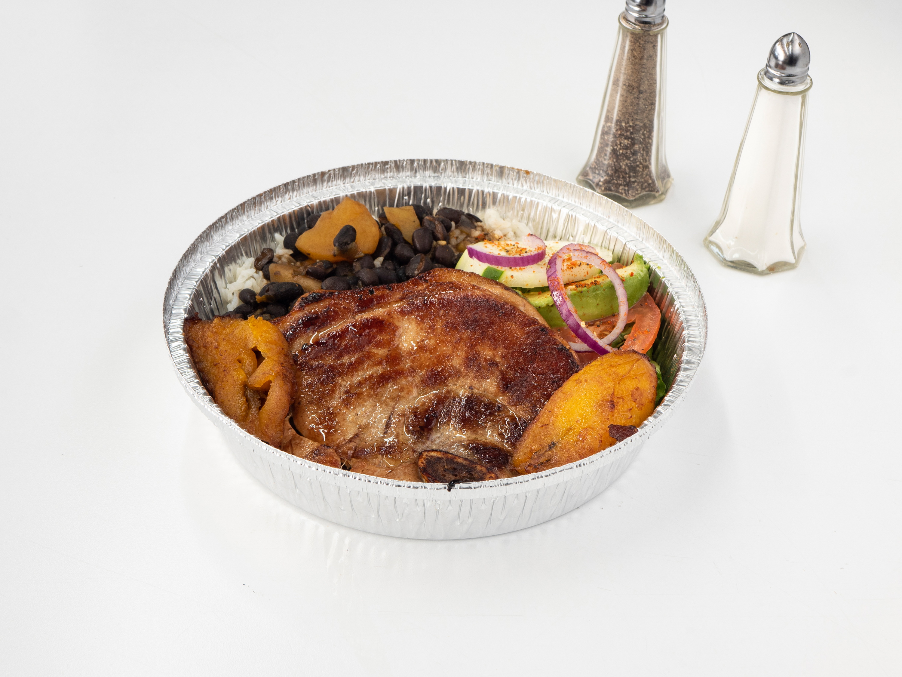 Order Rice and Beans with Marinated Pork Chop food online from Papa Tapas store, Branchburg on bringmethat.com