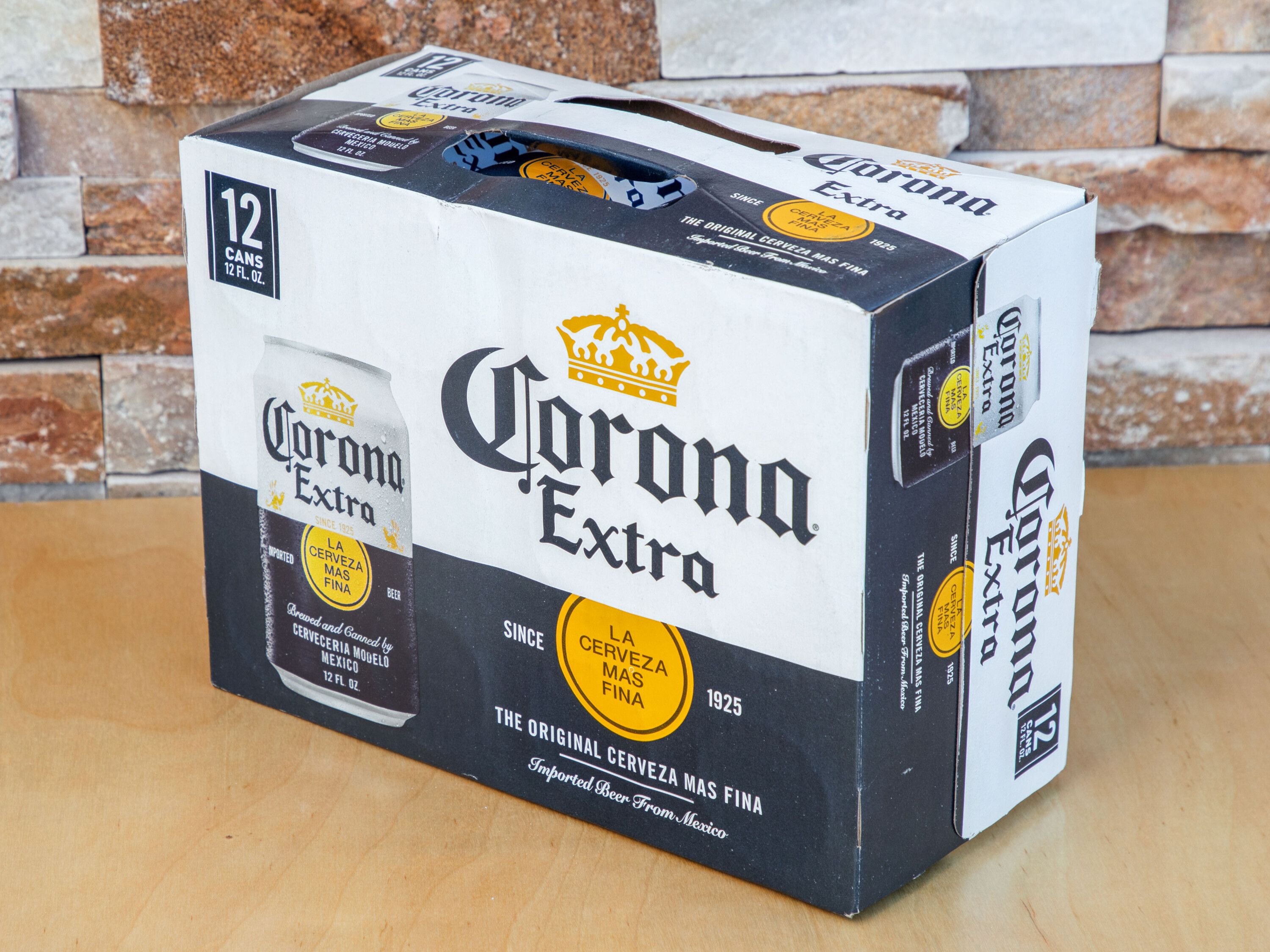 Order 12 Canned Corona Extra  food online from Sk Food Mart store, Mesa on bringmethat.com