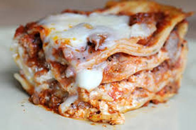 Order Meat Lasagna food online from Serranos pizza store, San Francisco on bringmethat.com