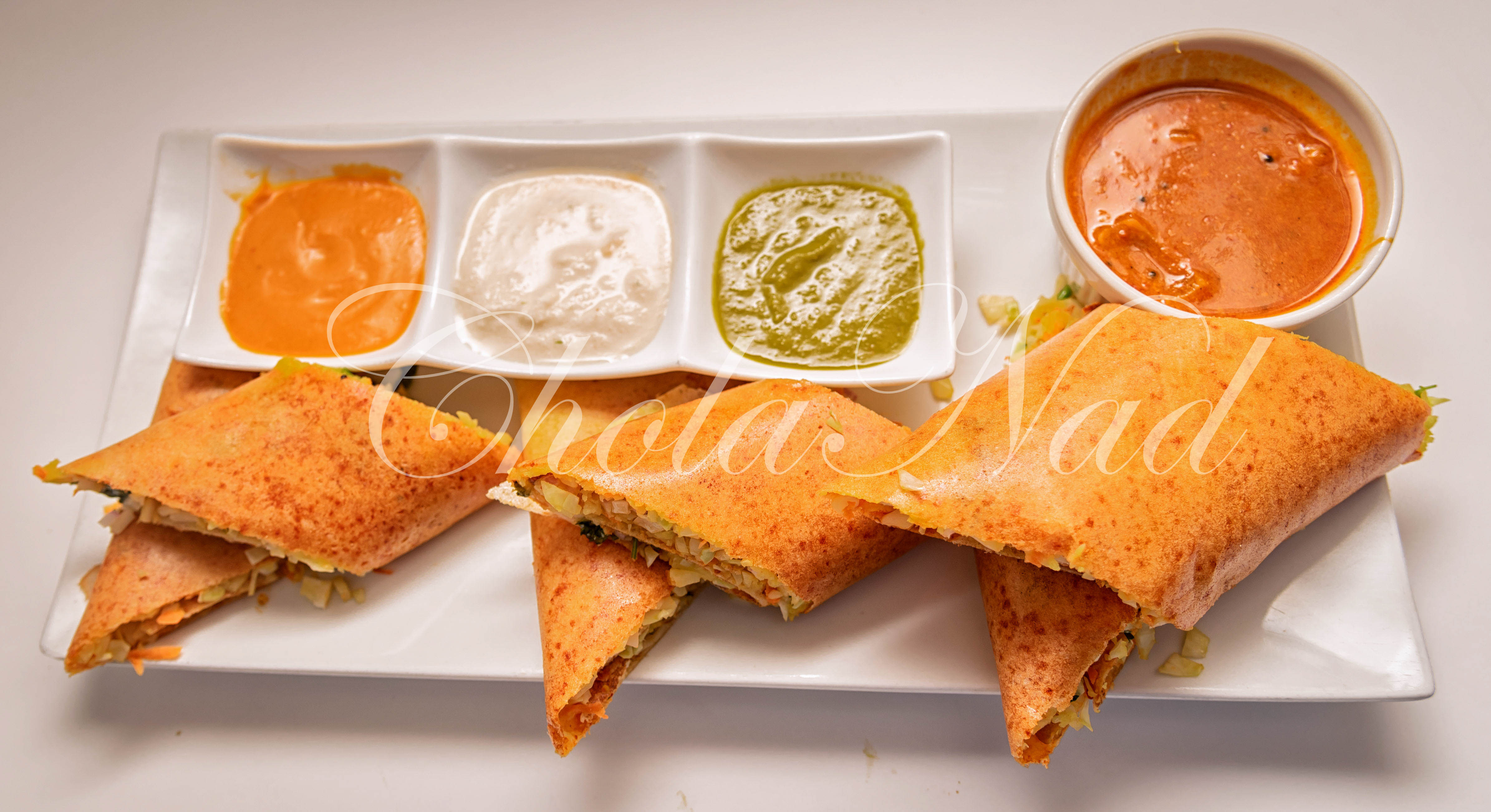 Order Spring Dosa food online from Cholanad store, Chapel Hill on bringmethat.com