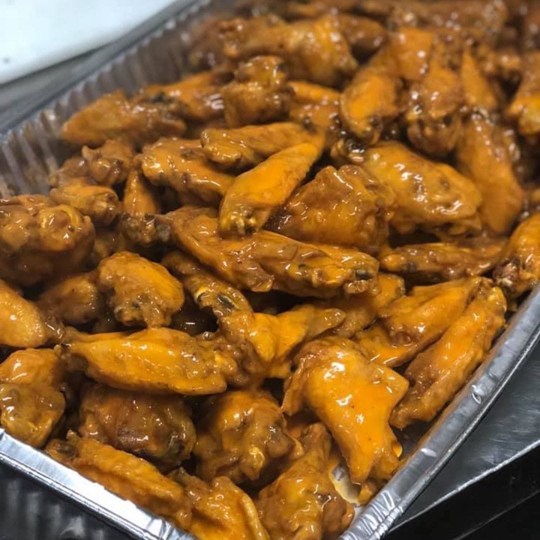 Order Buffalo Wings Catering - Half Pan (48 Pieces) food online from Planet Pizza store, Ridgefield on bringmethat.com
