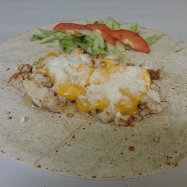 Order Grilled Chicken Caesar Wrap food online from Pizza Wings & More store, Reisterstown on bringmethat.com