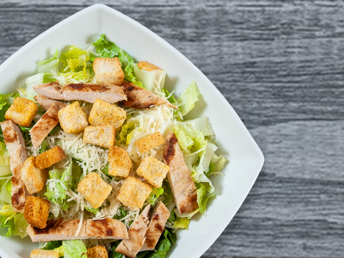 Order Caesar Salad food online from Seasons Pizza store, Wilmington on bringmethat.com