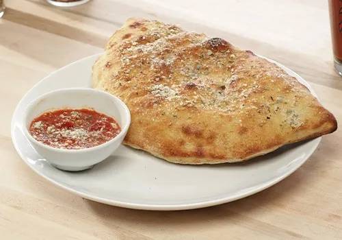 Order Build Your Own Calzone food online from Johnny's New York Style Pizza store, Dallas on bringmethat.com