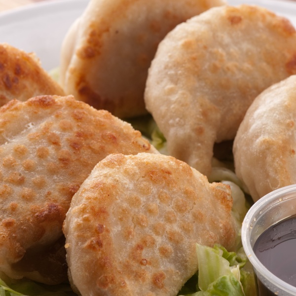 Order 10 Piece Pot Stickers food online from China A Go Go store, Las Vegas on bringmethat.com