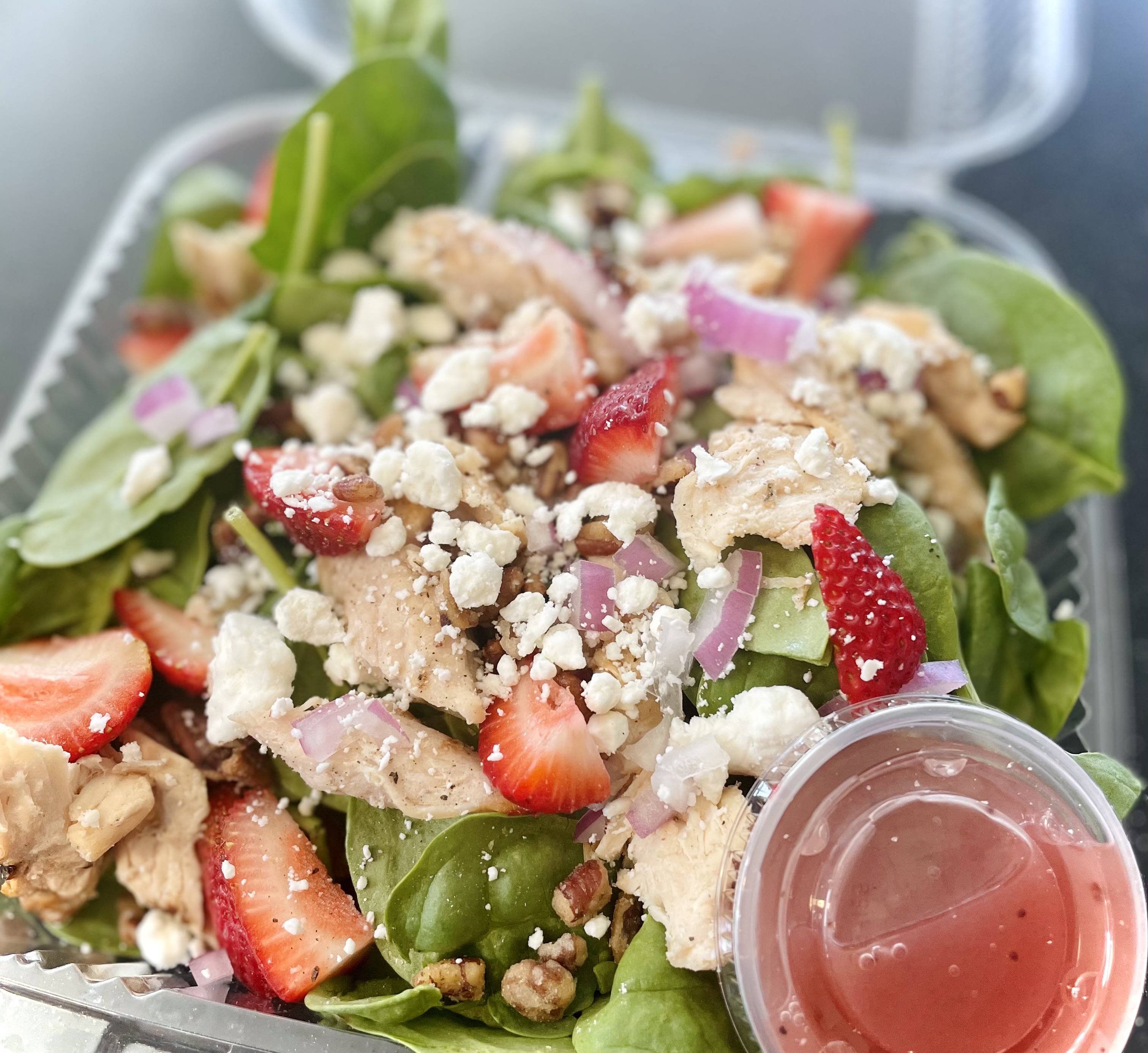 Order Baby Spinach, Strawberries, & Raspberry Salad  food online from Hugo Coffee Shop store, Park City on bringmethat.com