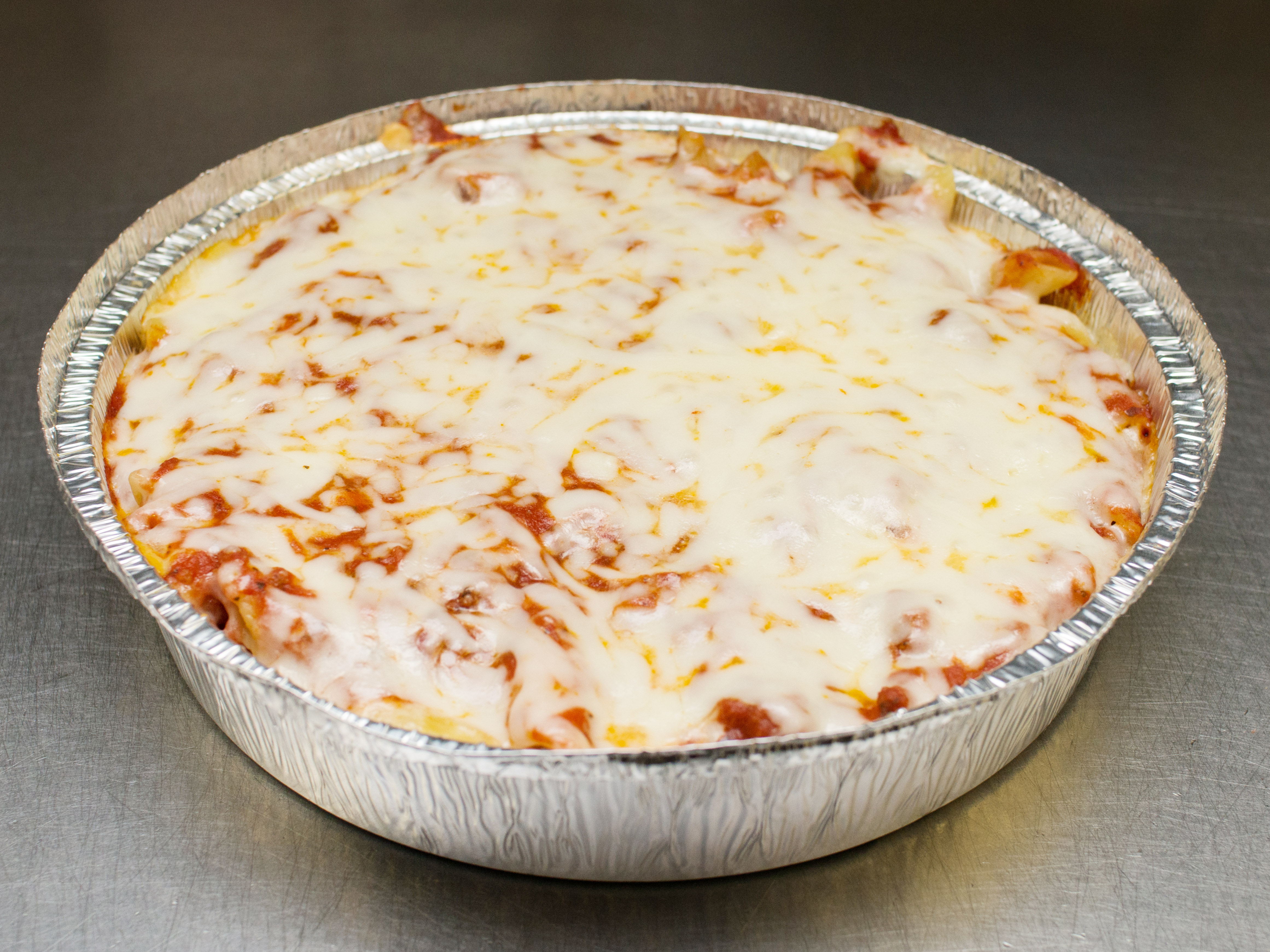 Order Baked Mostaccioli food online from Napoli Pizza store, Palatine on bringmethat.com