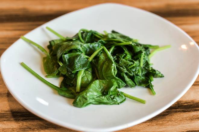 Order Steamed Spinach food online from Kerbey Lane Cafe store, Austin on bringmethat.com