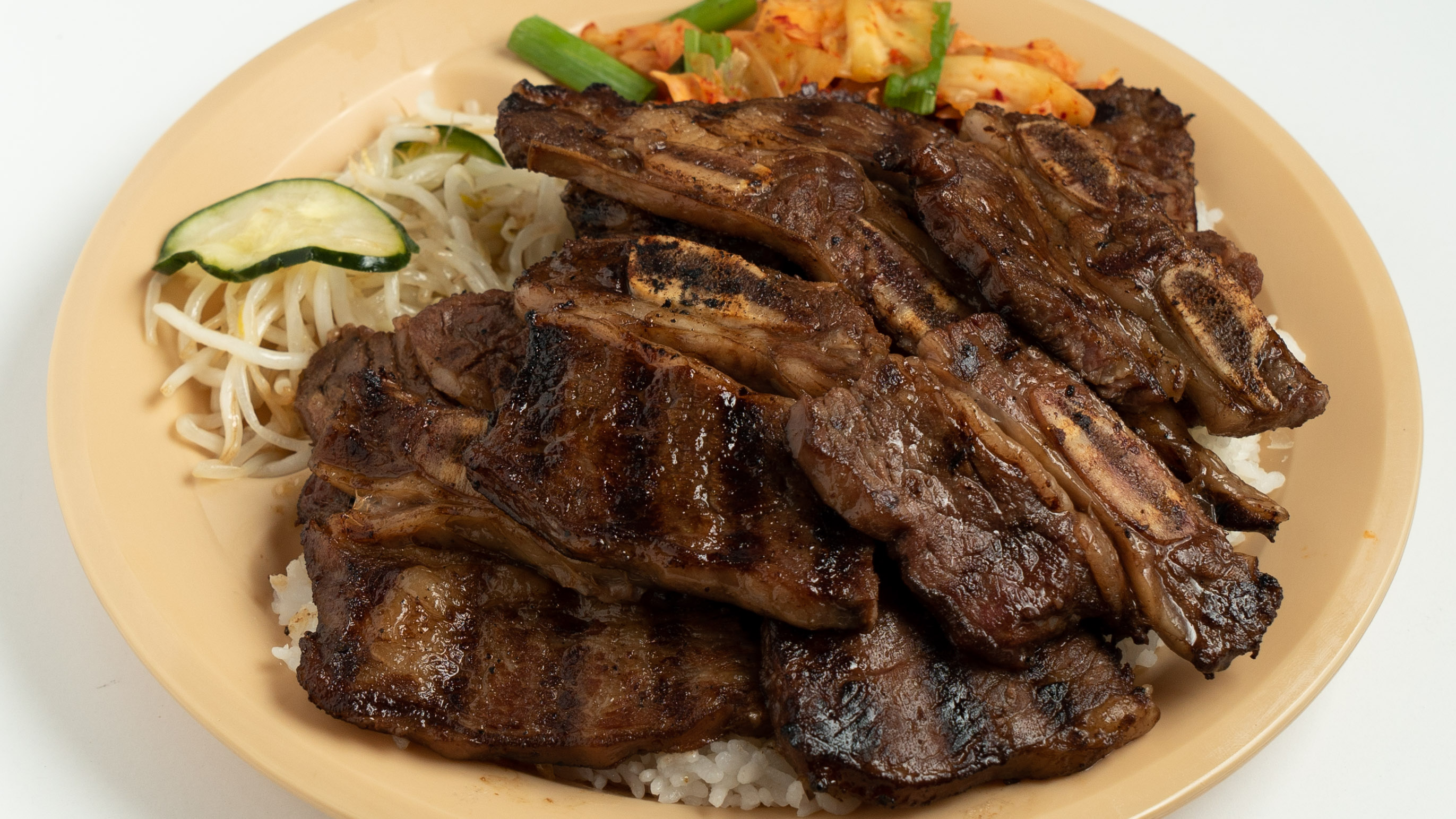 Order 4. Barbecue Short Rib food online from Steve Korean Bbq store, Berkeley on bringmethat.com