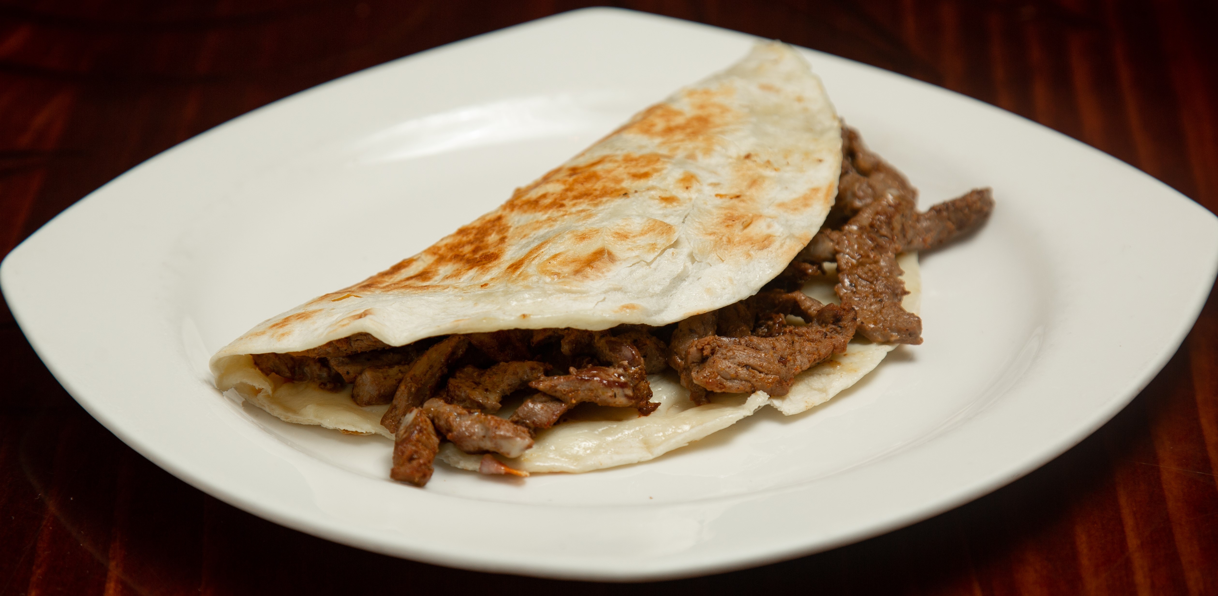 Order Grilled Beef Quesadilla food online from Tito Mexican Restaurant store, Spring Hill on bringmethat.com