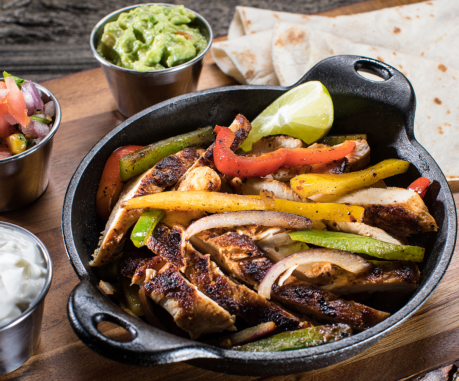 Order Garlic Lime Chicken Fajitas food online from Mixteco Mexican Grill store, Chicago on bringmethat.com