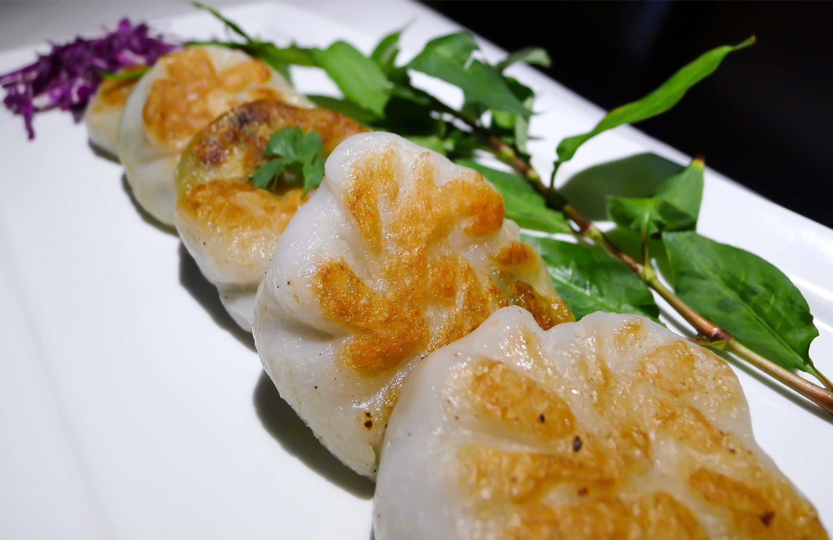 Order Chive Dumplings (Jiu-cai) (4) food online from Tong's Thai Restaurant store, San Antonio on bringmethat.com