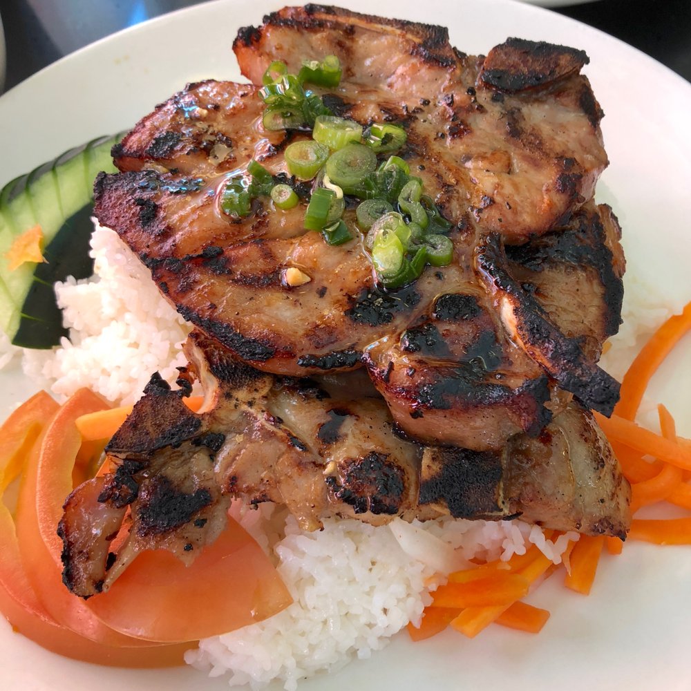 Order Grilled Pork Chop over White Rice (Cơm sườn nướng) food online from Hello Saigon store, New York on bringmethat.com