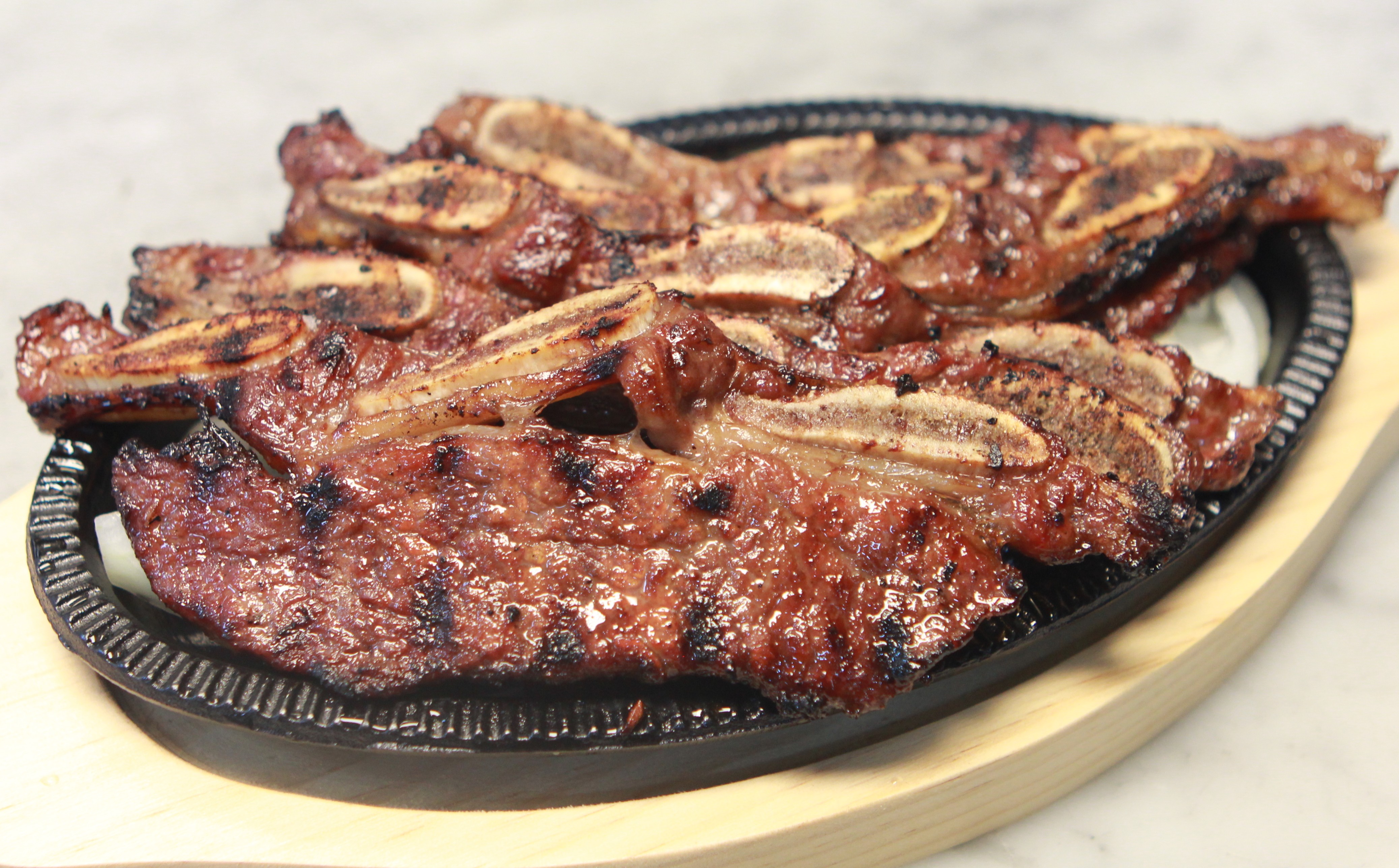 Order B1. Beef Galbi food online from Korean BBQ Grill store, New Rochelle on bringmethat.com