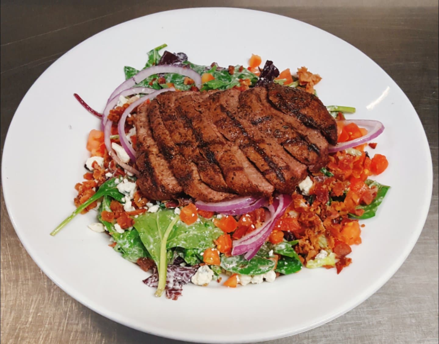Order Black & Blue Flat Iron Steak Salad food online from Anyway Pub store, Oakbrook Terrace on bringmethat.com