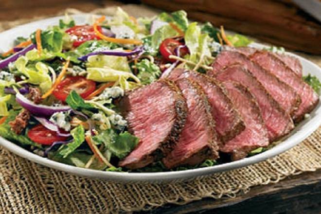 Order Steakhouse Salad* food online from Outback Steakhouse store, Buena Park on bringmethat.com