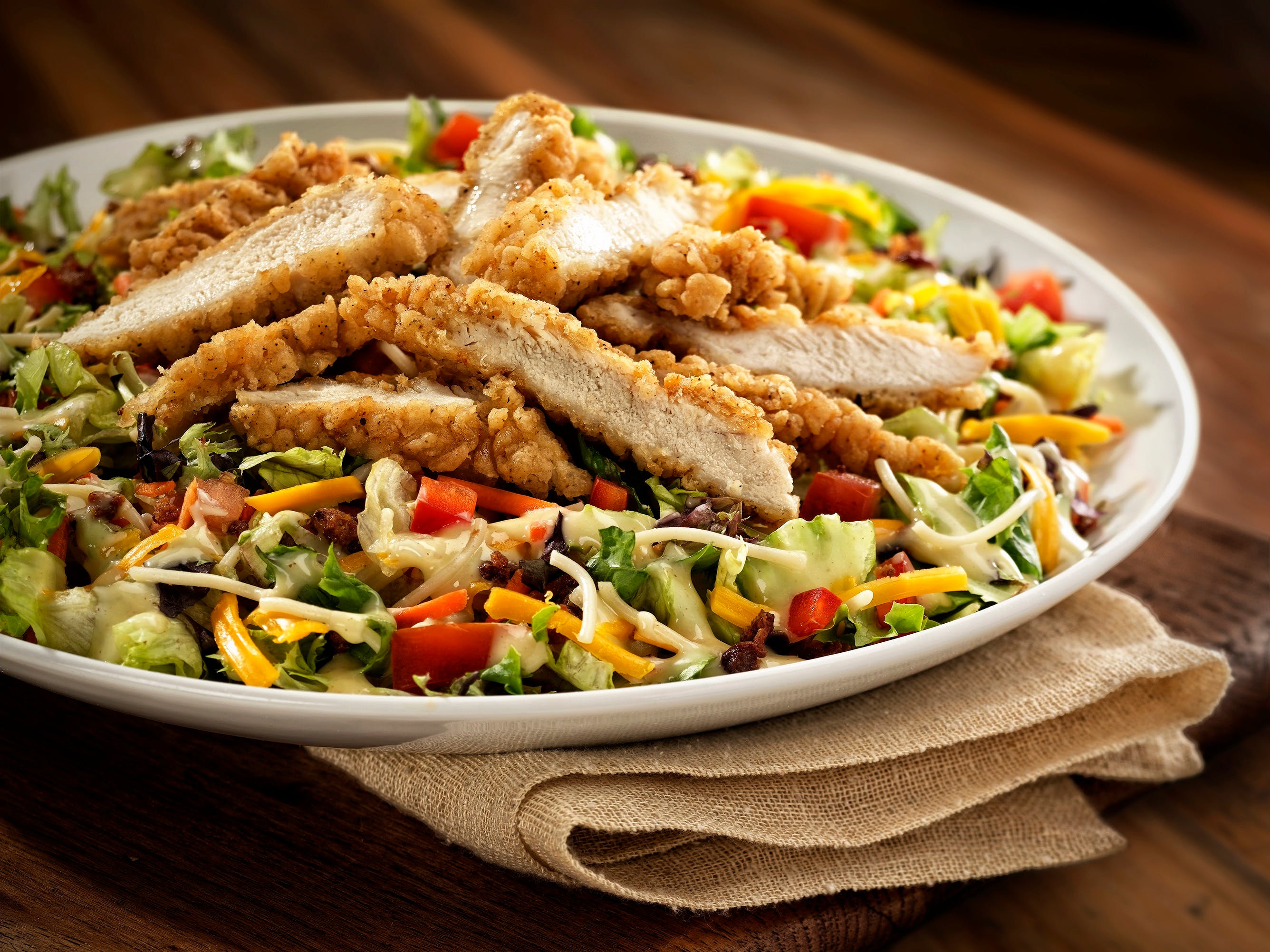 Order Chopped Honey Crisp Chicken Salad - Salad food online from UNO Pizzeria & Grill store, Oaks on bringmethat.com
