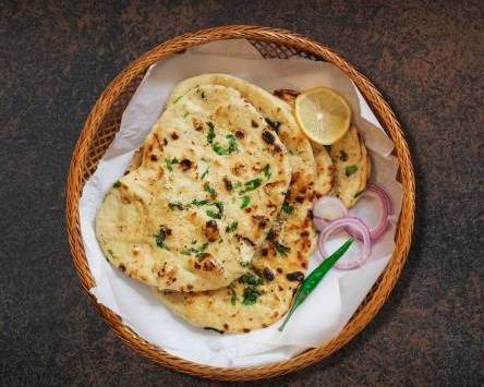 Order Garlic Naan Fiesta food online from Ministry of Curry store, Florence on bringmethat.com