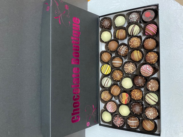 Order 1 Lb Box of Assorted Truffles food online from Chocolate Boutique store, Pittsburgh on bringmethat.com