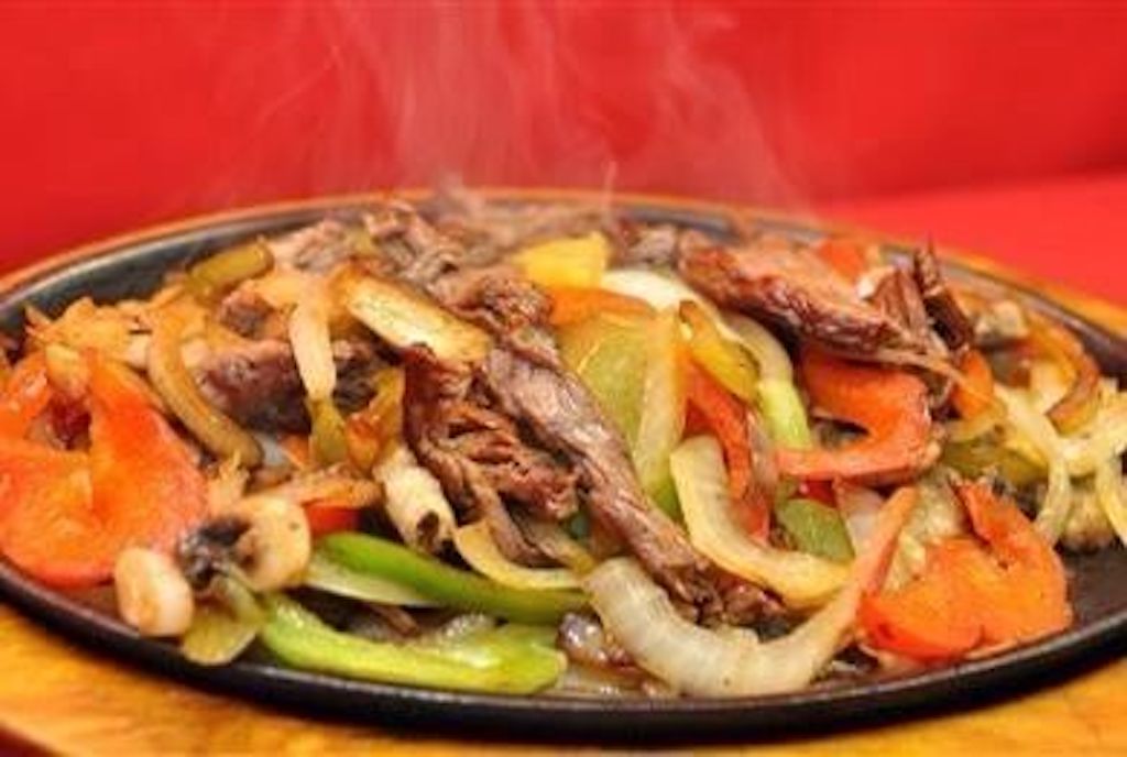 Order Steak Skillet Fajitas food online from Fiesta Mexican Restaurant store, Kennewick on bringmethat.com
