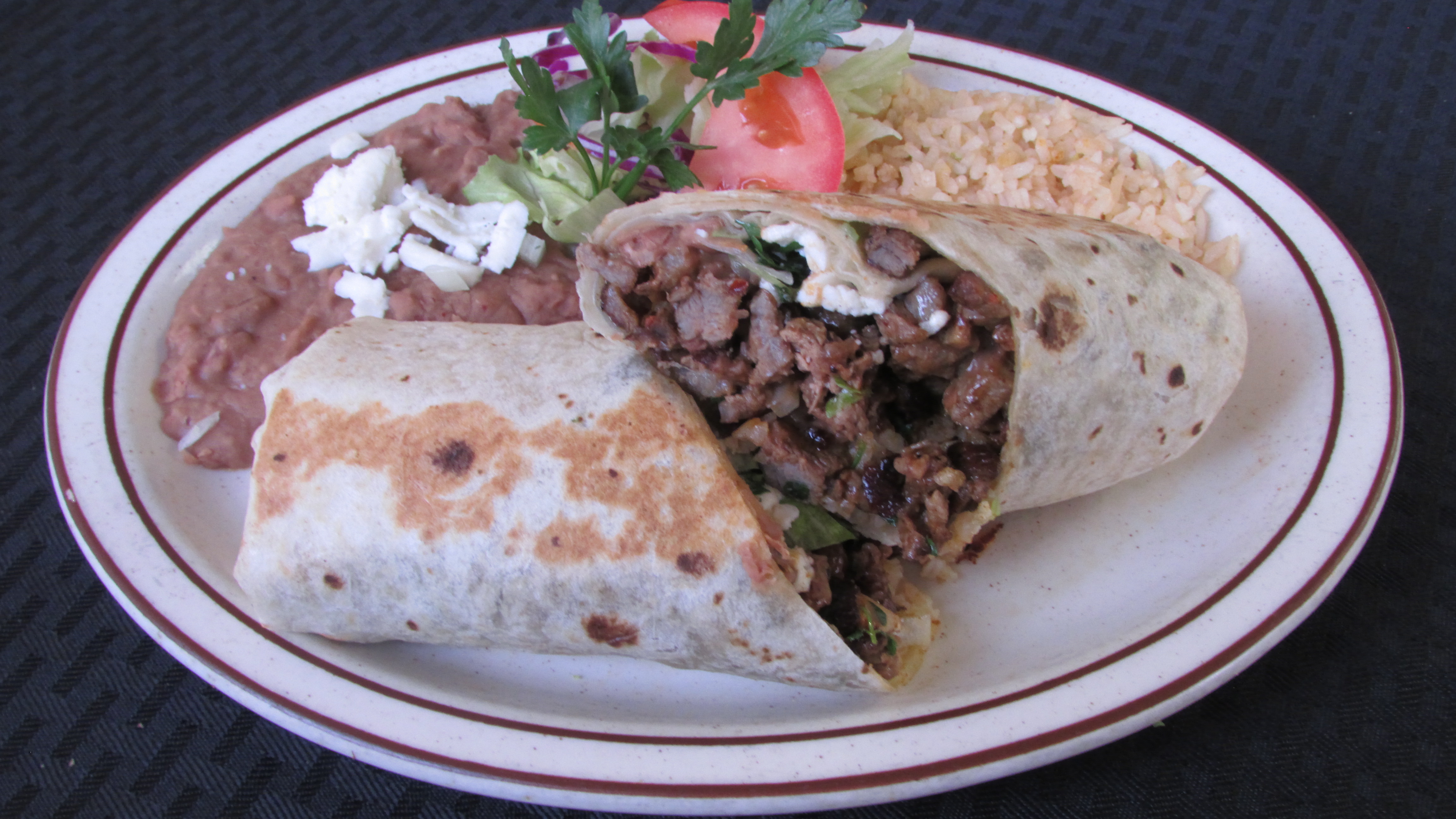 Order Carne Asada Burrito food online from Tortillas Restaurant store, Cathedral City on bringmethat.com