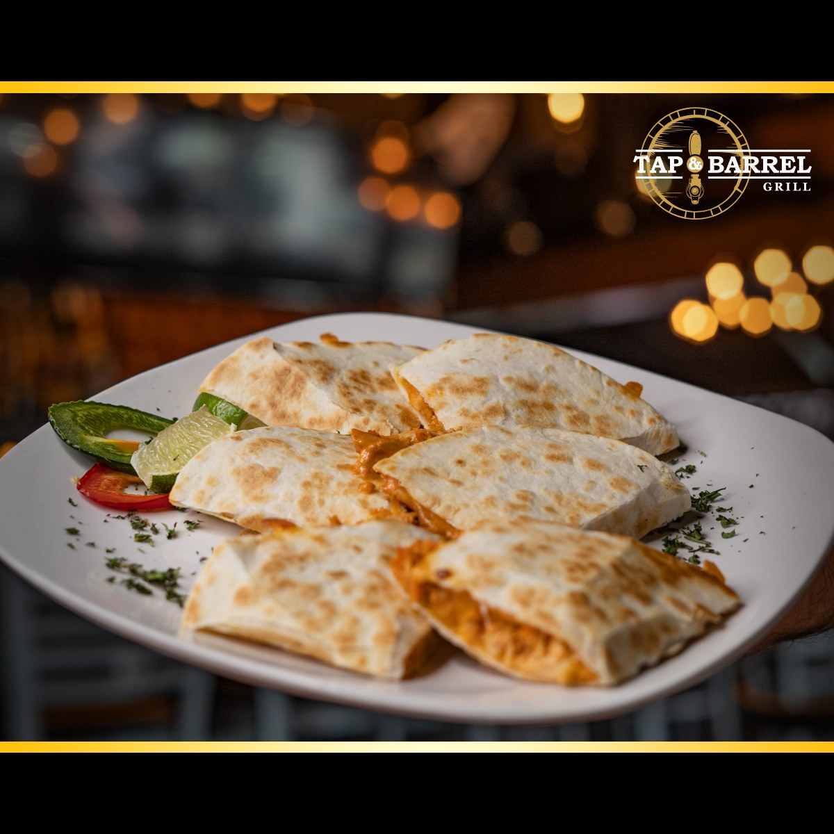 Order MINI CHICKEN QUESADILLAS food online from Tap & Barrel Grill store, Shelby Charter Township on bringmethat.com