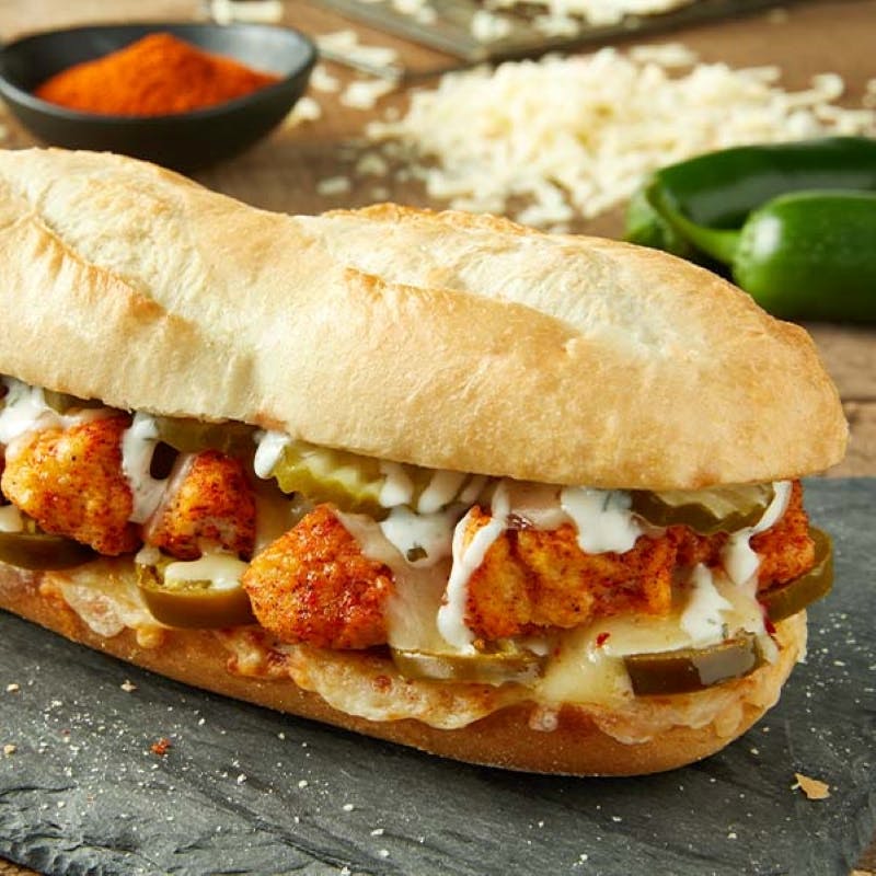 Order Hot Chicken Sub - Sub food online from Donatos Pizza store, Hudson on bringmethat.com