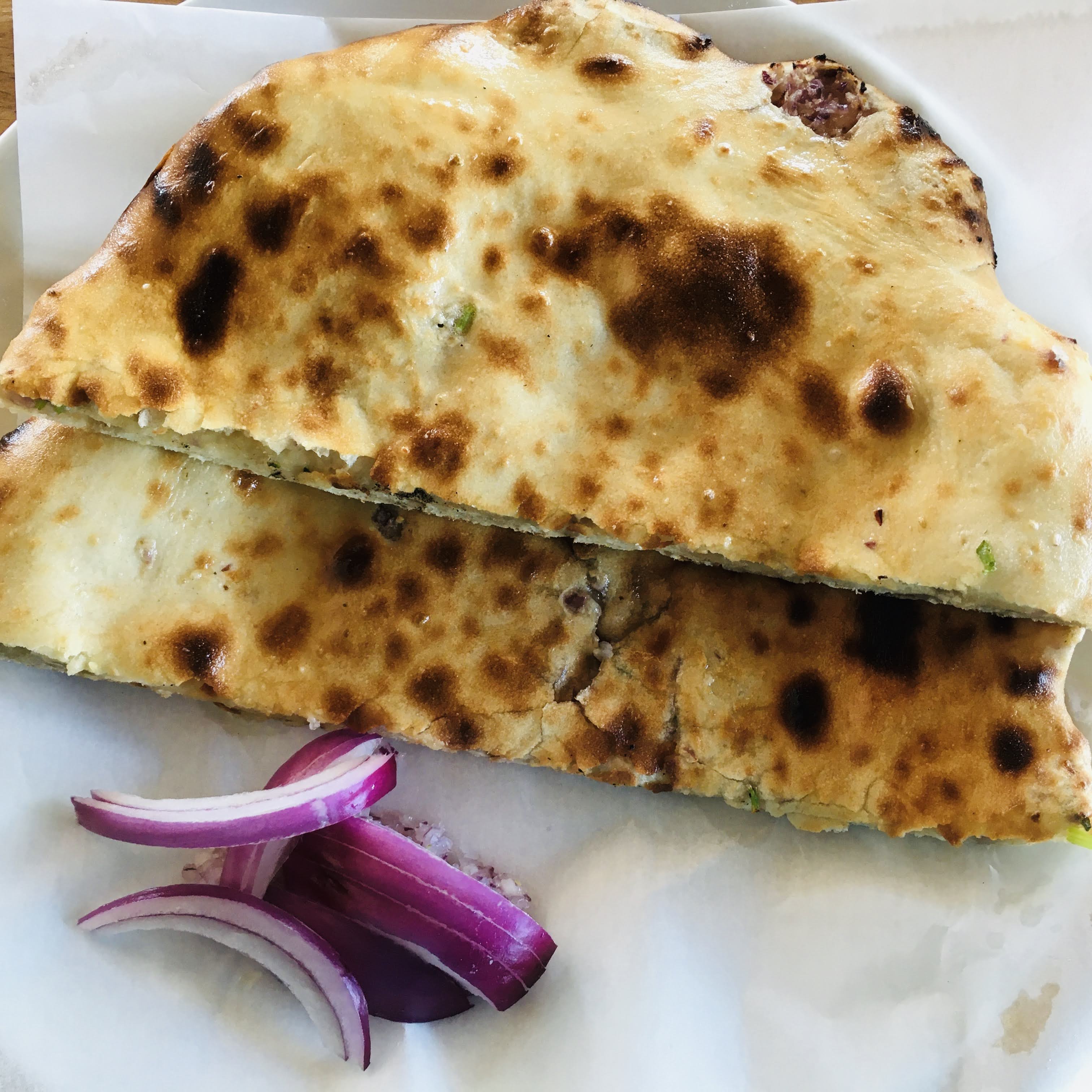 Order Onion Naan food online from Manchurian Indian Cuisine store, West Sacramento on bringmethat.com