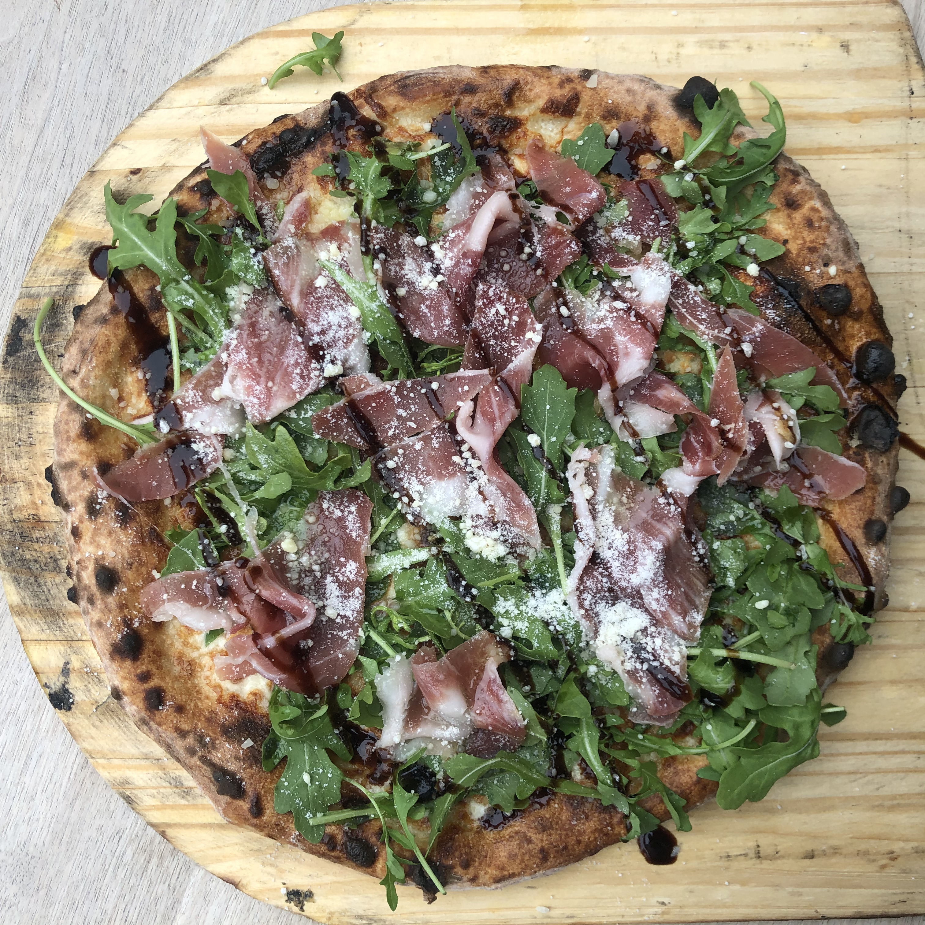 Order 12" Shaved Local Prosciutto & Arugula Pizza  food online from The Marshal store, New York on bringmethat.com