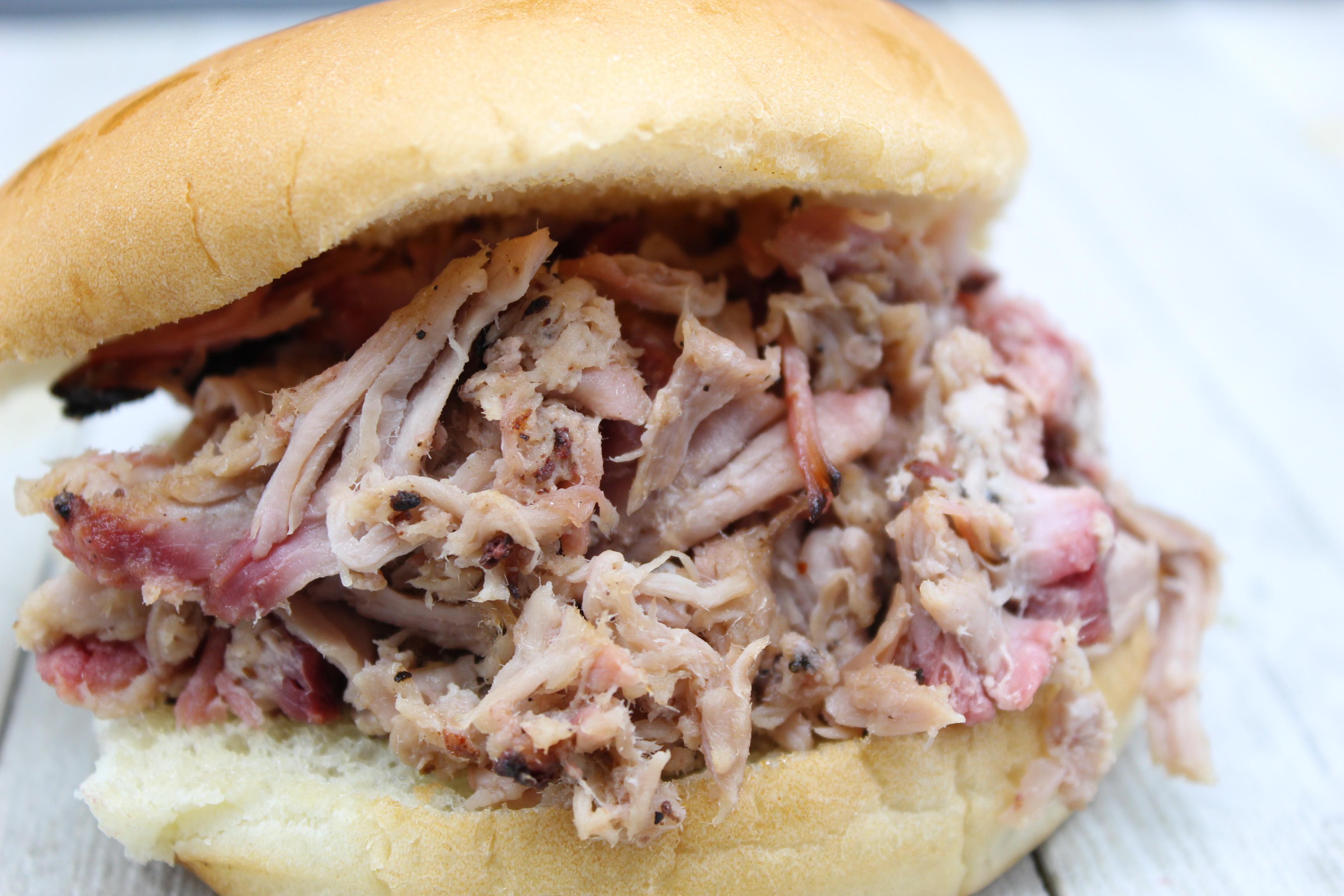 Order Pulled Pork Sandwich food online from Mckenzie's Barbeque store, Conroe on bringmethat.com