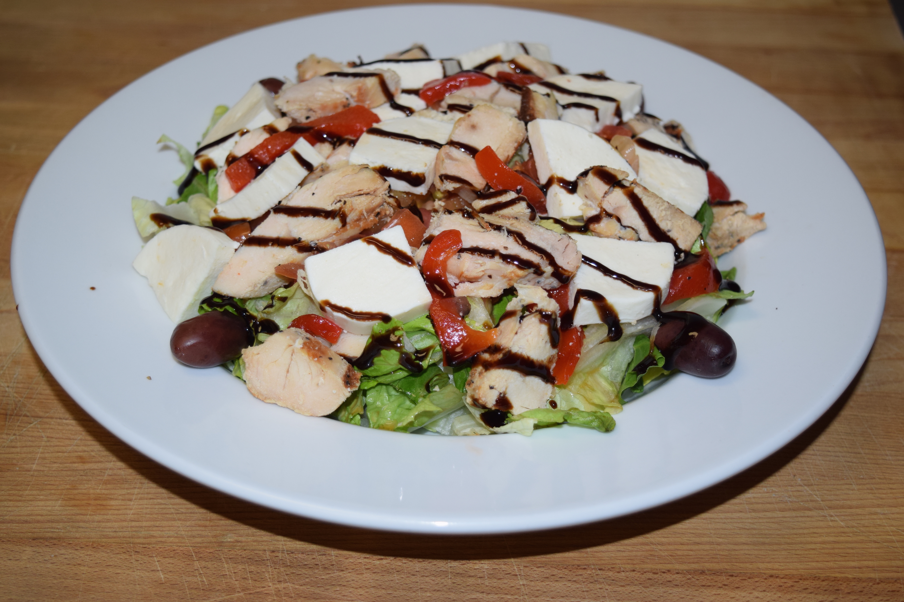 Order Chicken Caprese Salad food online from Cuzino Pizza & Pasta store, North East on bringmethat.com
