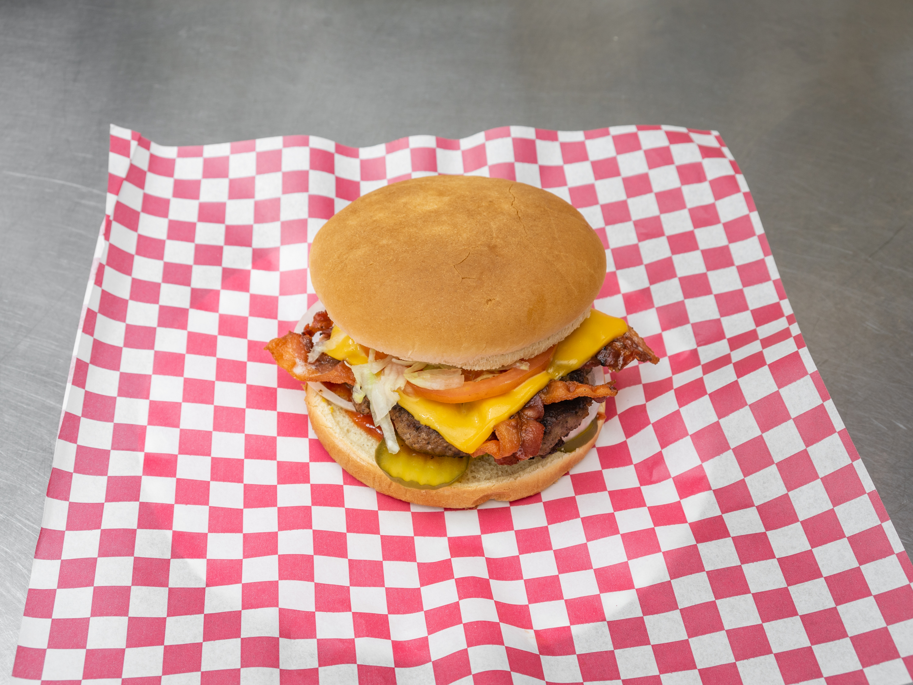 Order Bacon Cheeseburger food online from Flames Grill- 1258 Eastdale Cir store, Montgomery on bringmethat.com