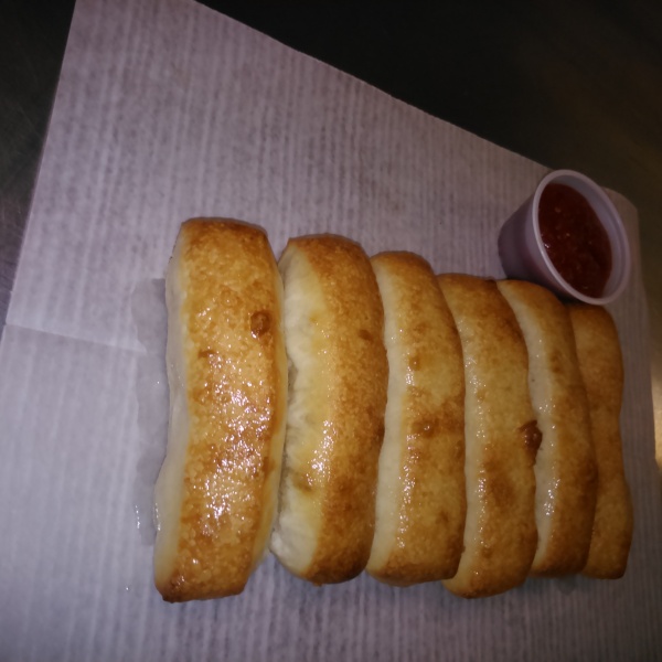 Order 6 Bread Sticks  food online from The Champion Pizza store, Houston on bringmethat.com