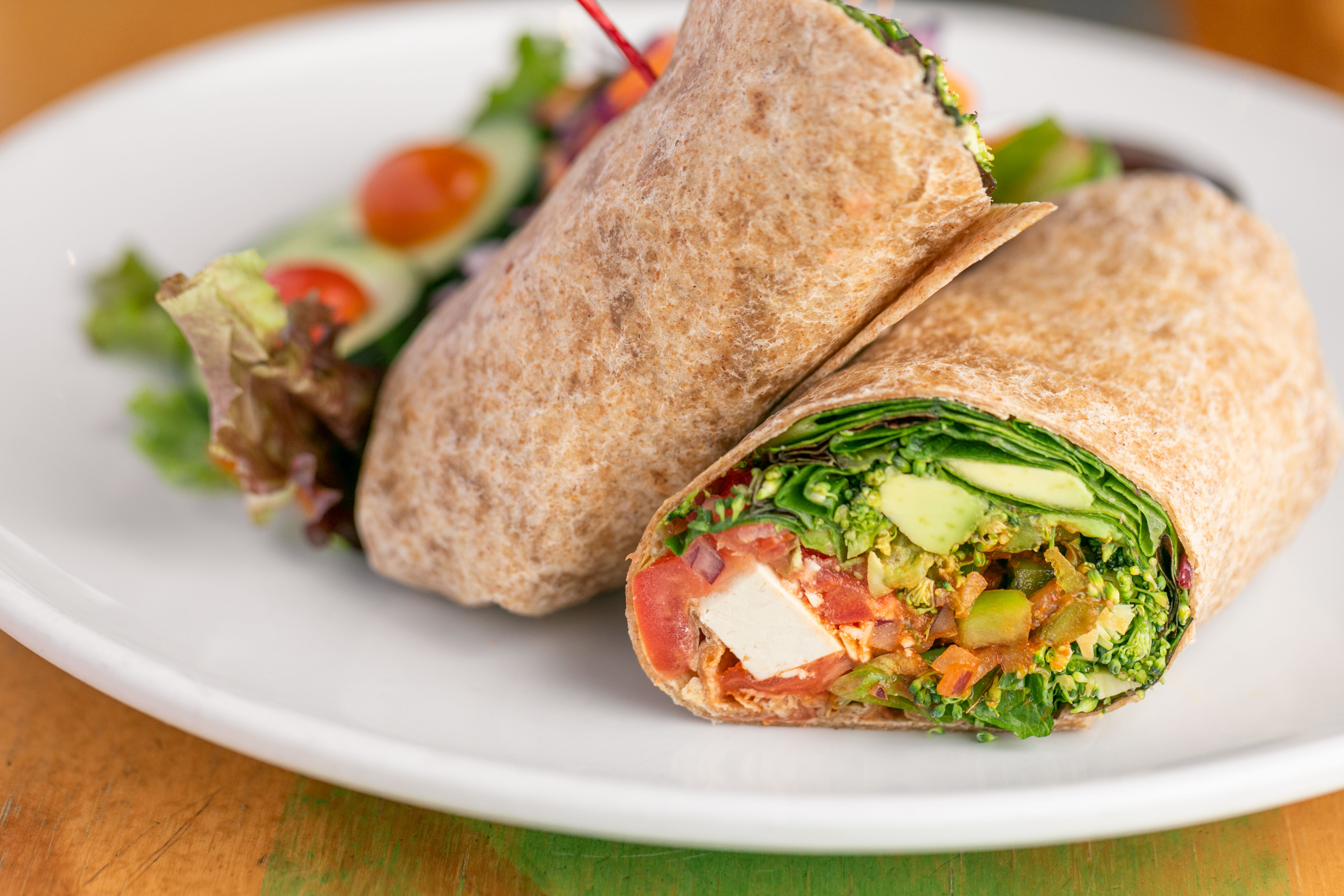 Order Protein Veggie Wrap* food online from Swami Cafe store, San Diego on bringmethat.com