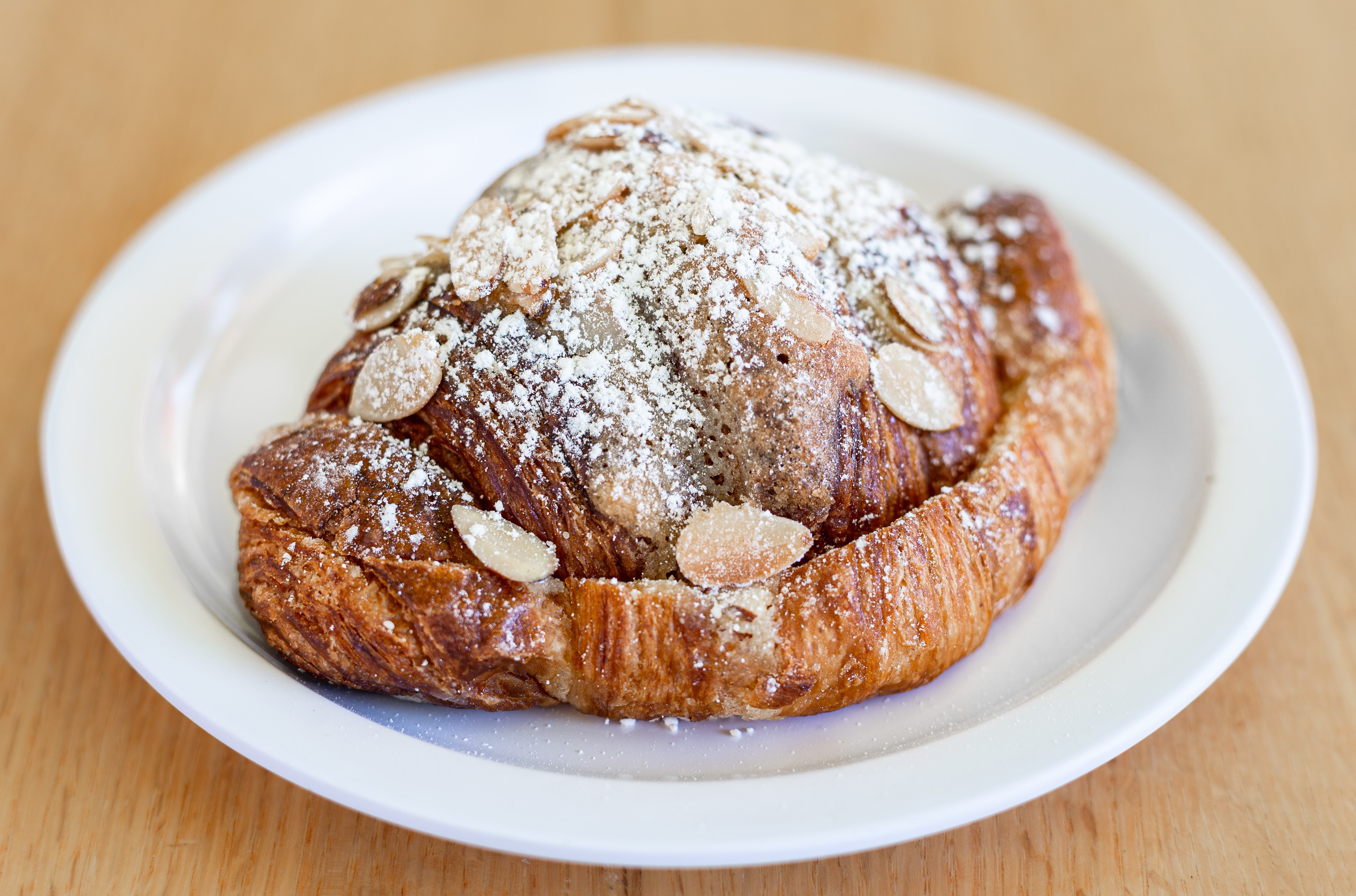 Order Almond Croissant food online from Courageous Bakery & Cafe store, Oak Park on bringmethat.com
