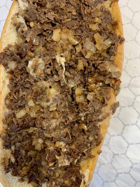 Order (12oz) Philly cheesesteak with peppers and onions (12oz of meat on a Amoroso roll) food online from From Philly To Charlit store, Charlotte on bringmethat.com